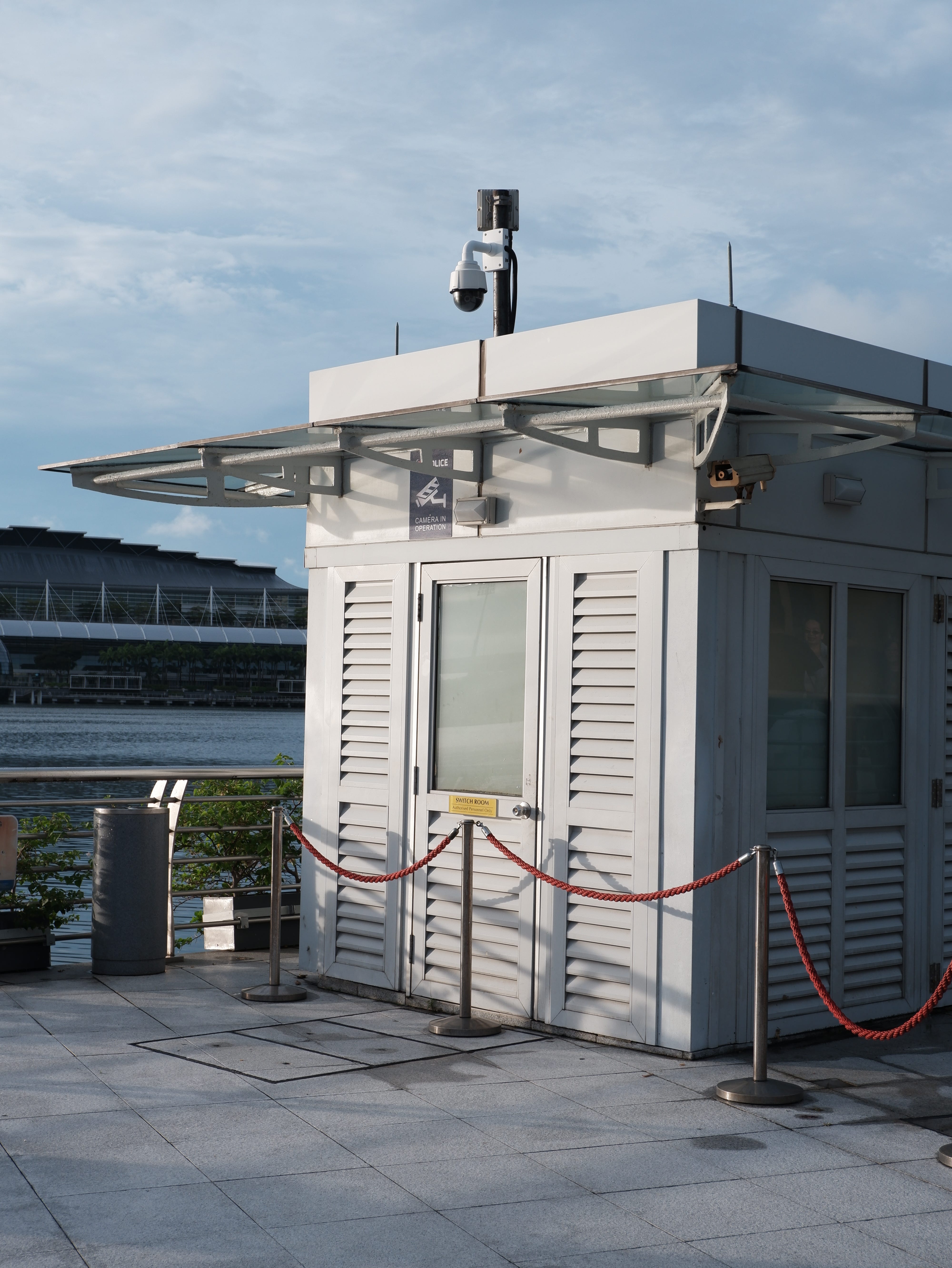 A souvenir shop shuttered and cordoned off.