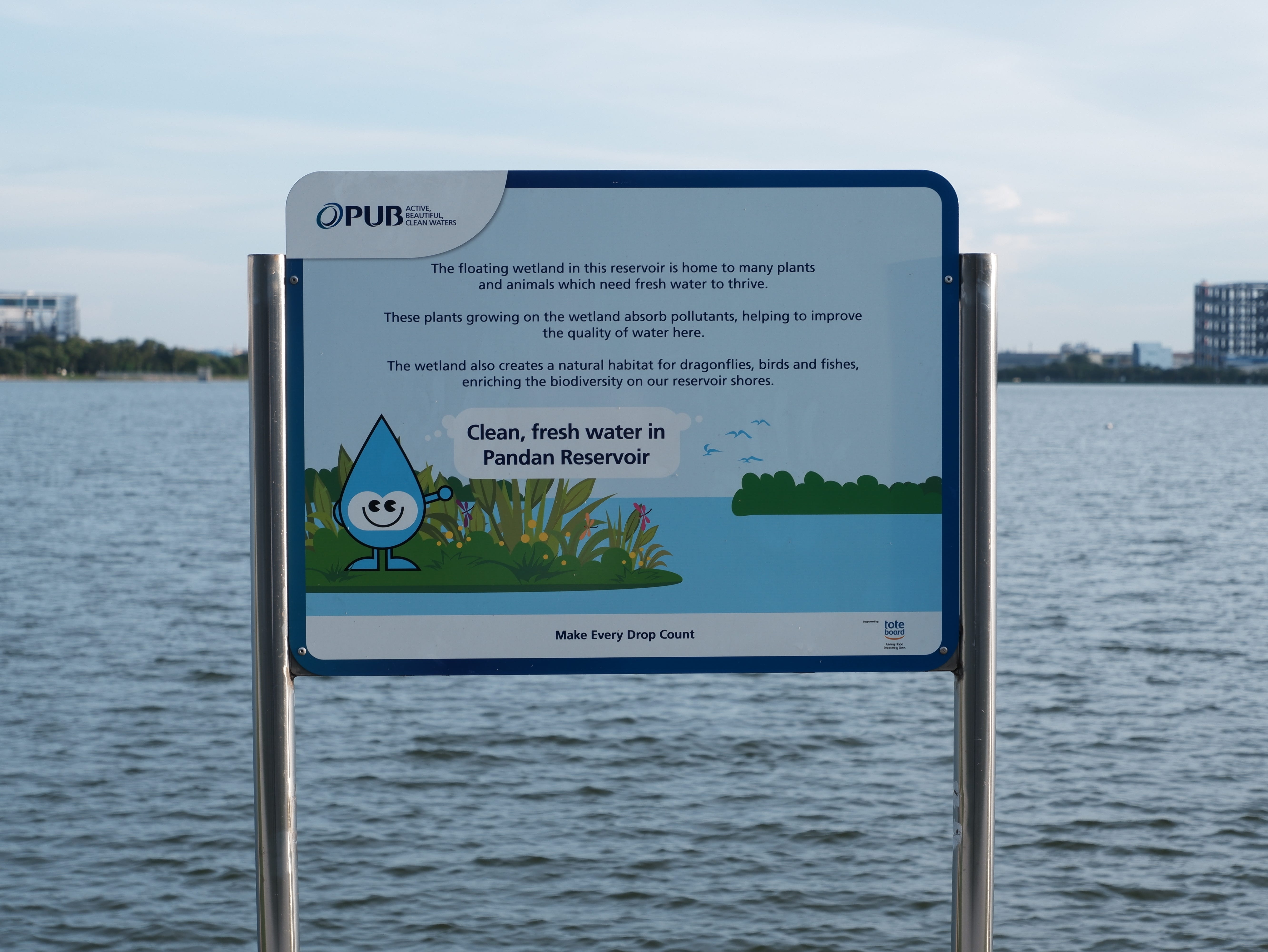 A more recently installed sign with information about the reservoir.